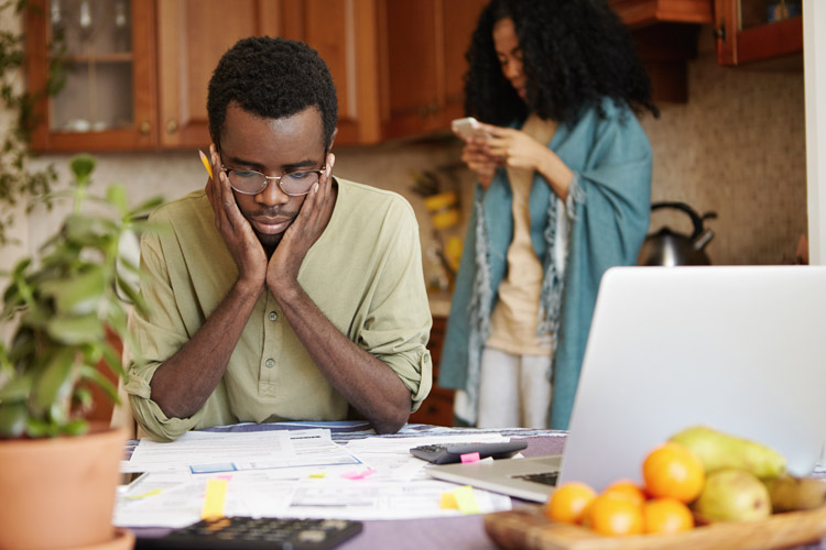 Two people working on finances