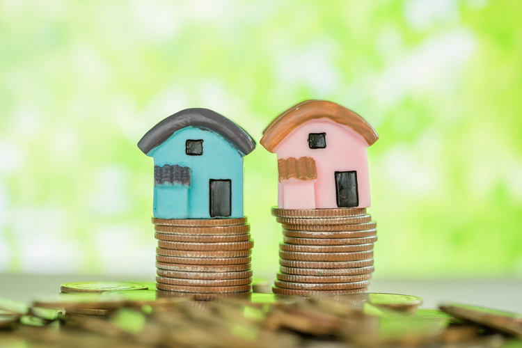 Two tiny homes on top of coins