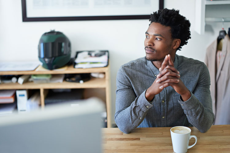 Man considering his home buying decision