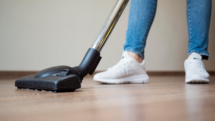Person cleaning floor