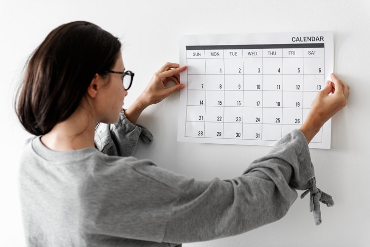 Woman checking calendar