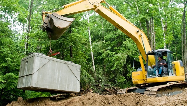 Bulldozer putting in septic system